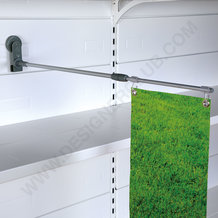 Telescopic banner holder for metal wall